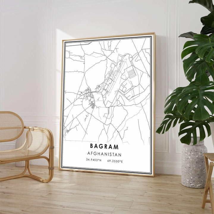 Minimalist Bagram Afghanistan city map print featuring clean vector road lines and geographic coordinates in monochrome black, presented by MapYourDreams in choices including unframed poster paper, stretched canvas wall art, or custom framed prints in classic black frames for living room spaces.