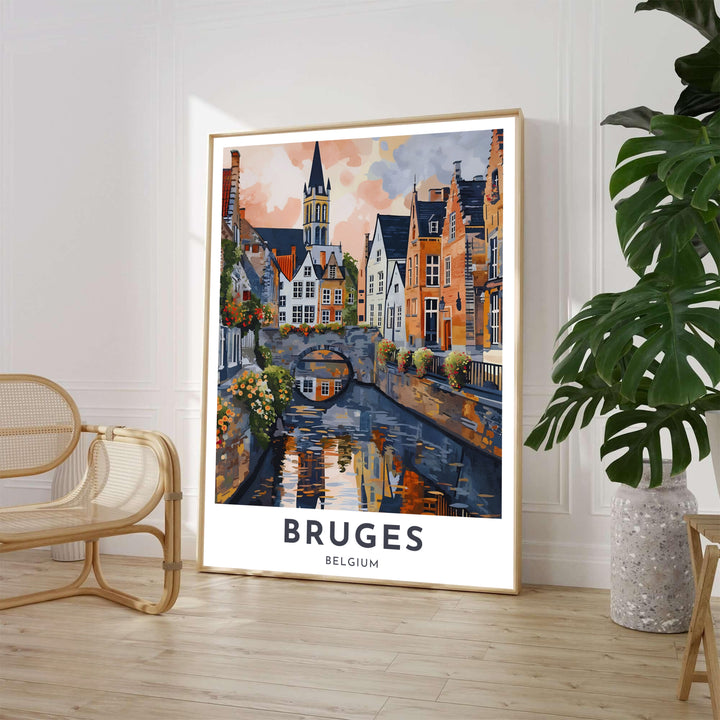 An impressionistic travel poster depicting the picturesque canal reflections and medieval architecture of Bruges, Belgium, in warm terracotta, slate blue, and sunset orange tones. Available from MapYourDreams in various choices like standalone unframed paper, tailored wooden frames, and gallery-wrapped canvas options.