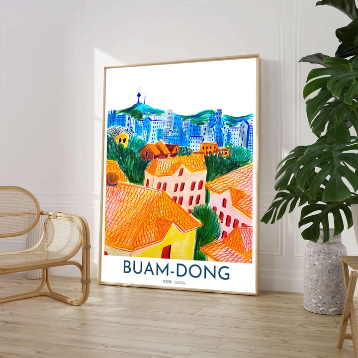 Hand-drawn colored pencil illustration of the Buam-dong neighborhood in Seoul, showcasing terraced orange-roofed houses nestled against emerald green trees with the iconic N Seoul Tower skyline. Offered by MapYourDreams, this artwork is available in flexible options including unframed paper, custom wooden frames, and gallery canvas wraps.