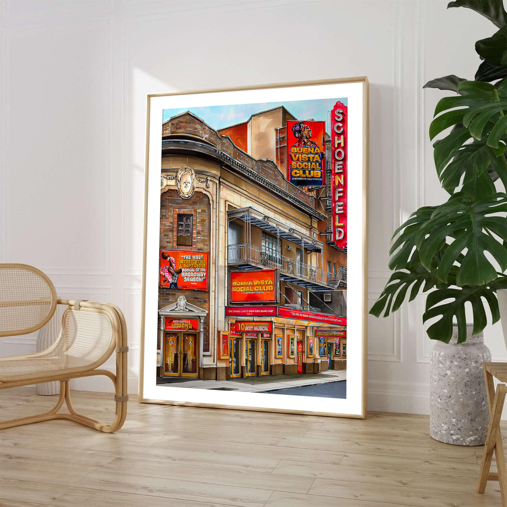 Architectural Theatre District print featuring the ornate facade and red neon sign of the Gerald Schoenfeld Theatre in Manhattan NYC, available from MapYourDreams where shoppers can select unframed fine art posters, gallery wrapped canvas decor, and custom frame options for home music rooms.