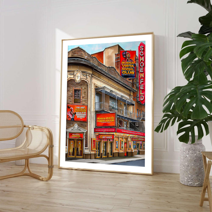 Architectural Theatre District print featuring the ornate facade and red neon sign of the Gerald Schoenfeld Theatre in Manhattan NYC, available from MapYourDreams where shoppers can select unframed fine art posters, gallery wrapped canvas decor, and custom frame options for home music rooms.