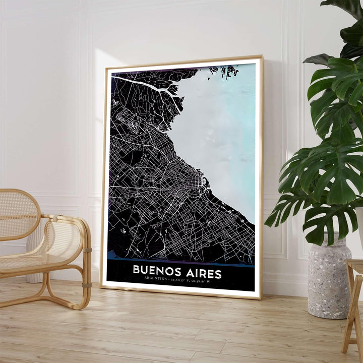 Modern city grid wall art of Buenos Aires featuring dark black urban blocks and a pale icy blue Río de la Plata estuary. Available through MapYourDreams, customers can select from versatile presentation formats including fine art paper, solid wood frames, and stretched canvas options.