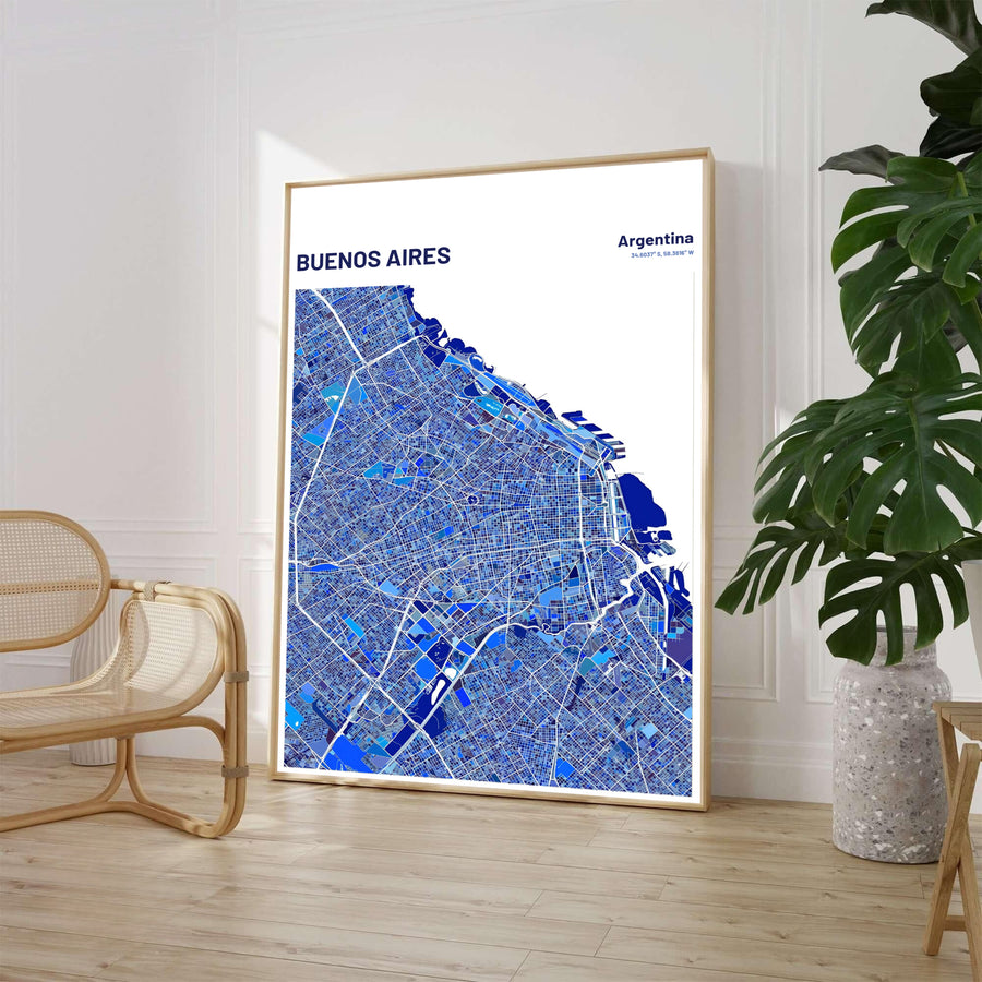 Modern geometric city grid wall art of Buenos Aires featuring rich blue urban blocks and white road network lines. Available through MapYourDreams, customers can select from versatile presentation formats including fine art paper, solid wood frames, and stretched canvas options.