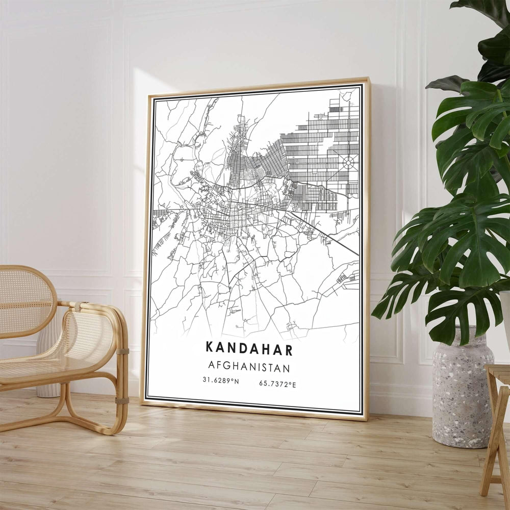 Modern cartography print of Kandahar, Afghanistan, featuring crisp black vector street grids and city avenues against a stark white background. Available from MapYourDreams as an unframed paper poster, a gallery-wrapped canvas print, or a custom framed wall decor piece with a natural wood frame for living rooms.