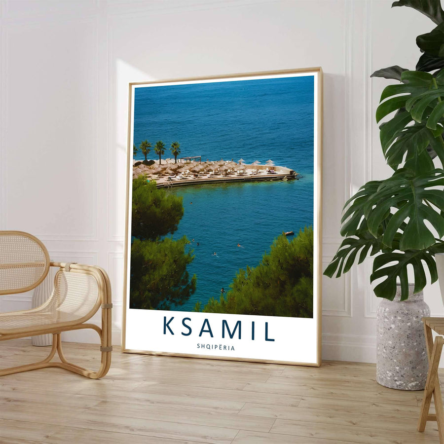 A stunning coastal photograph captures the resort coastline of Ksamil with crystal-clear Ionian sea waters and swimmers enjoying the summer sun. Customers can select from unframed archival paper stock, custom wood frames, or gallery canvas wraps to suit their home interior style preferences.