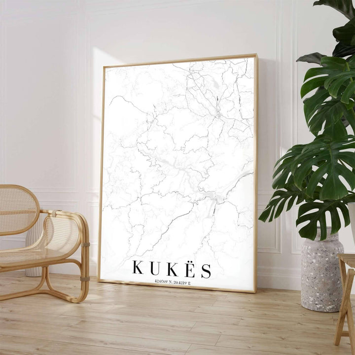A high-contrast monochrome street map highlights the road network of Kukës County, set against a clean white background with elegant serif typography. Select from flexible display choices like unframed paper stock, custom frames in various wood finishes, or gallery canvas wraps.