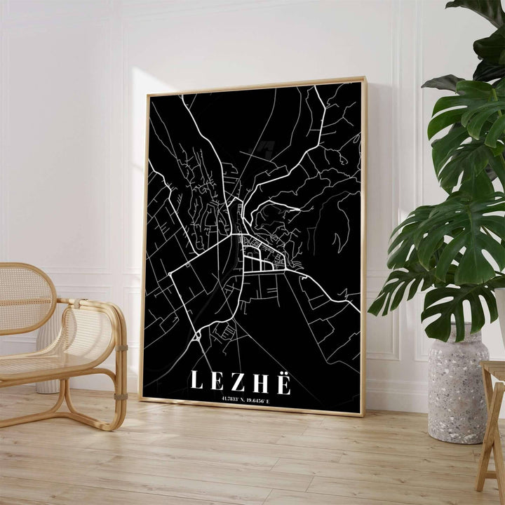 A high-contrast inverted monochrome street map highlights the road network of Lezhë, set against a deep black field with elegant serif typography. Select from flexible display choices like unframed paper stock, custom frames in various wood finishes, or gallery canvas wraps.