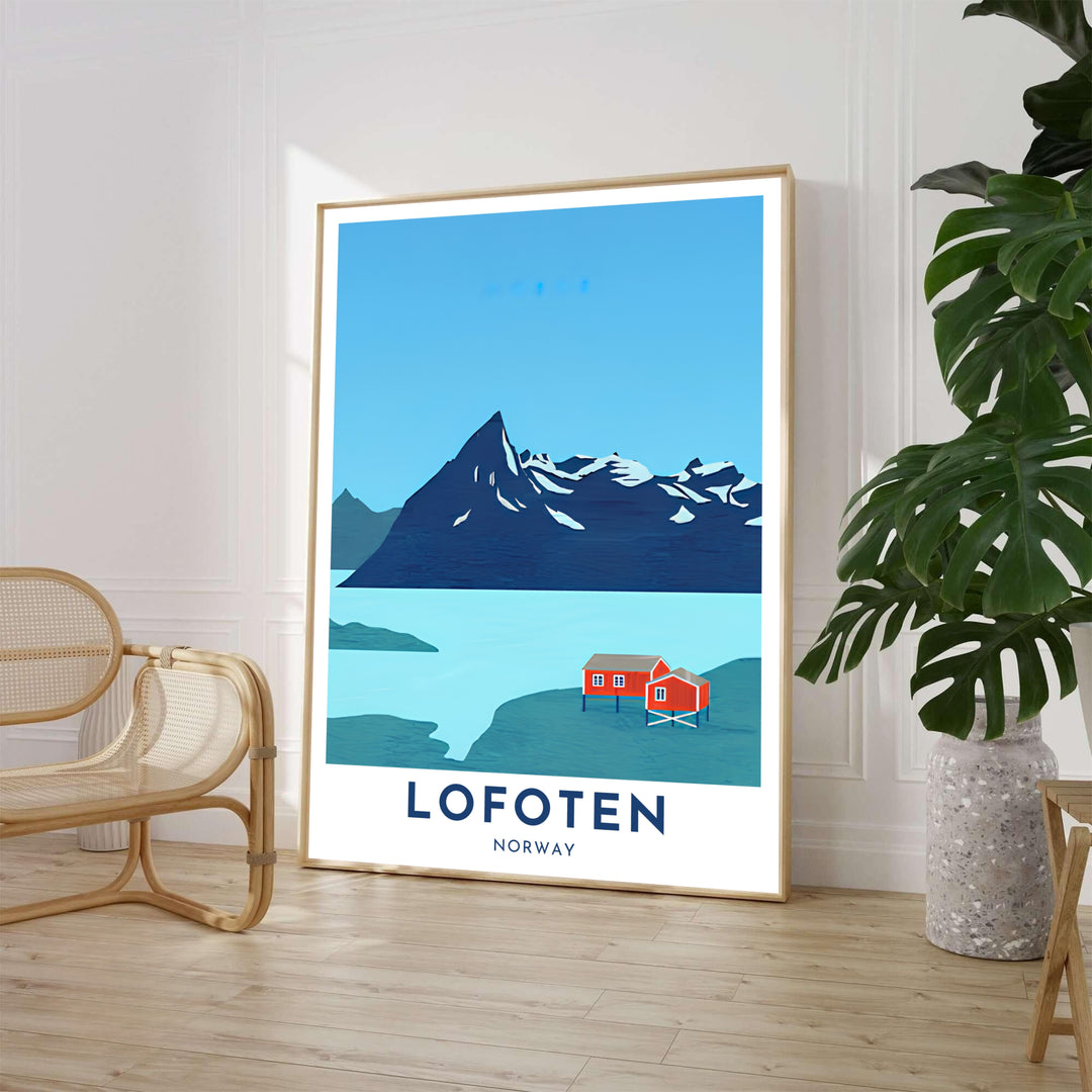 Modern Arctic landscape poster depicting traditional red fishing cabins in Lofoten Norway framed by crisp blue skies and sharp mountain contours. Ideal for home decor, this artwork is offered in multiple options including custom wood framed prints, gallery wrapped canvas, and unframed paper.