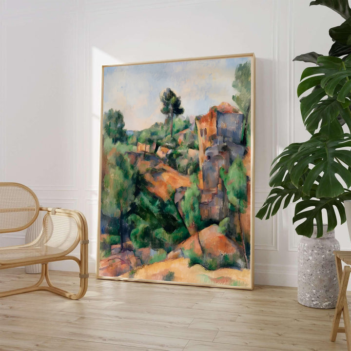 Paul Cezanne Bibemus Quarry 1895 fine art poster created in Aix-en-Provence France depicting orange sandstone cliffs and pine trees under a light blue sky. MapYourDreams provides custom framed wall art, unframed paper prints, and gallery stretched canvas wall decor options to elevate home decor.