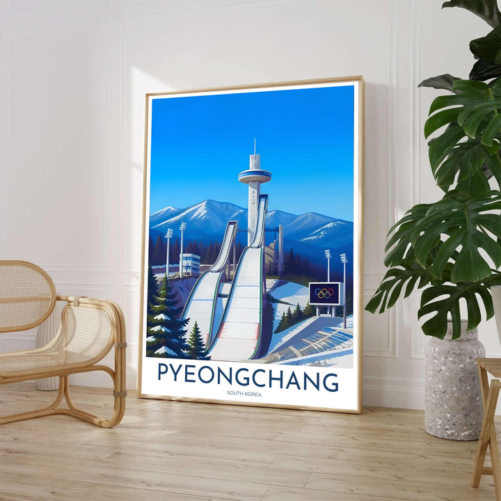 Scenic travel poster of Pyeongchang, South Korea, capturing the soaring observation tower and twin slopes of the Alpensia Ski Jump surrounded by snow-covered pine forests and alpine ridges. Offered by MapYourDreams, this artwork is available in flexible options including unframed paper, custom wooden frames, and gallery canvas wraps.