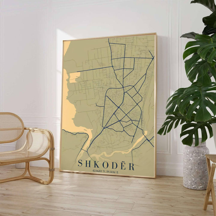 A sophisticated retro cartographic map highlights Lake Shkodër and municipal street networks in deep navy blue, set against an earthy olive background. Select from flexible display choices like unframed archival paper stock, custom wood frames, or gallery canvas wraps.