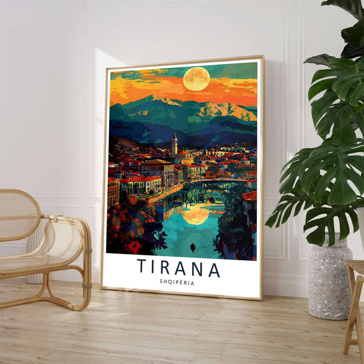 A striking expressionistic painting captures the romantic twilight atmosphere of Tirana, featuring vibrant evening colors reflecting across winding city waters. Customers can select from unframed archival paper stock, custom wood frames, or gallery canvas wraps to suit their home decor style.