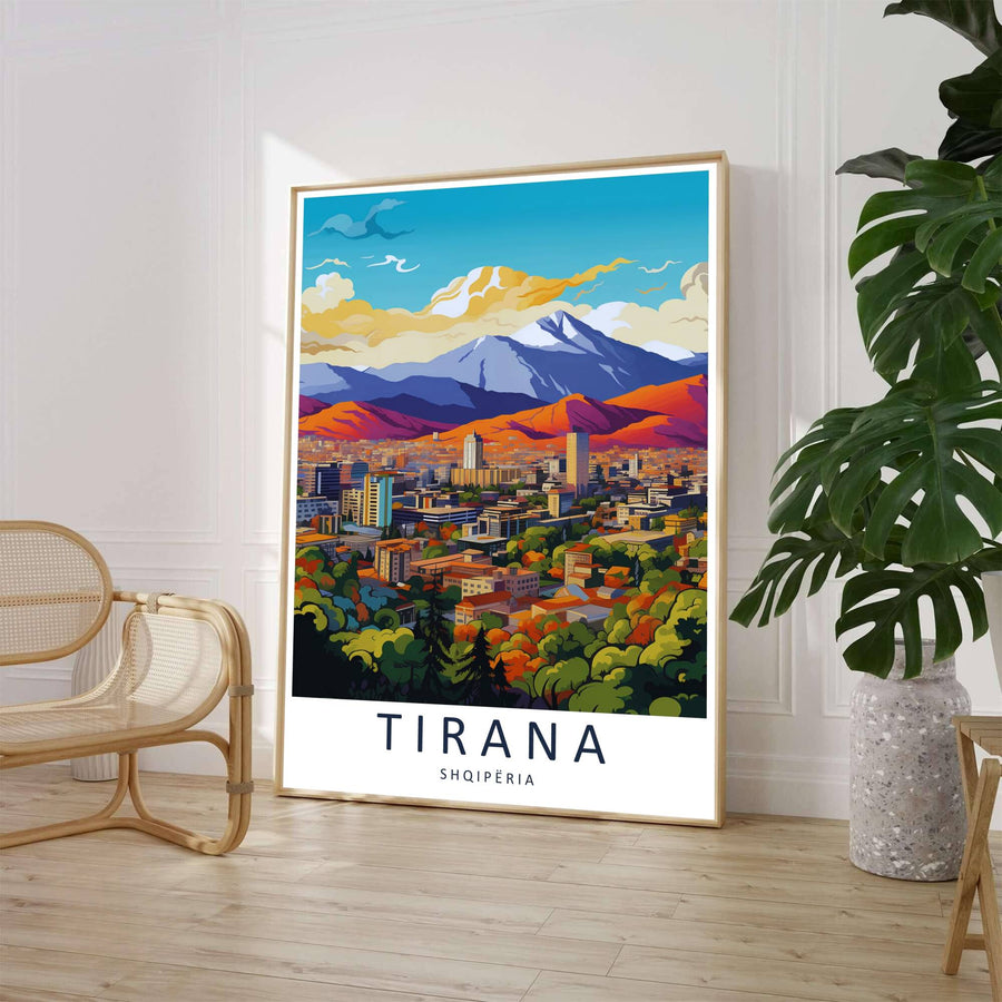 A clean mid-century travel illustration captures the expansive cityscape of Tirana framed by lush autumn park trees under a brilliant sunset sky. Customers can select from unframed archival paper stock, custom wood frames, or gallery canvas wraps to suit their home decor style.