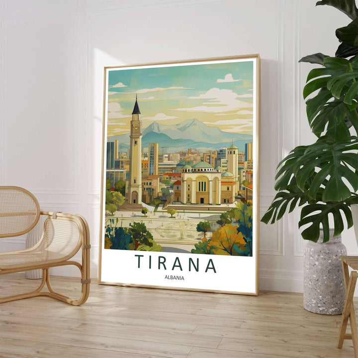 A clean contemporary travel illustration captures the expansive cityscape of Tirana framed by manicured public plazas and autumn trees beneath a bright daytime sky. Customers can select from unframed archival paper stock, custom wood frames, or gallery canvas wraps to suit their home decor style.