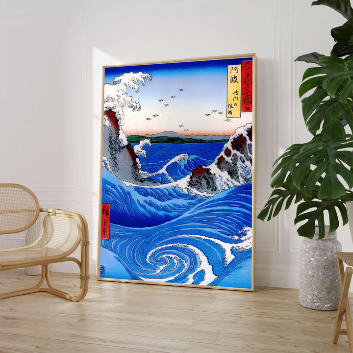 Classic Japanese Ukiyo-e wave art print Naruto Whirlpool Awa Province by artist Utagawa Hiroshige featuring ocean foam and distant horizon birds in Naruto Whirlpool Awa Province. MapYourDreams supplies framed, unframed, and canvas poster formats for home wall decor.