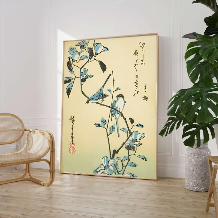 Classic Japanese Ukiyo-e floral art print Birds Flowering Branch by artist Utagawa Hiroshige featuring camellia blossoms and calligraphy in Edo Botanical Garden. MapYourDreams supplies framed, unframed, and canvas poster formats for home wall decor.