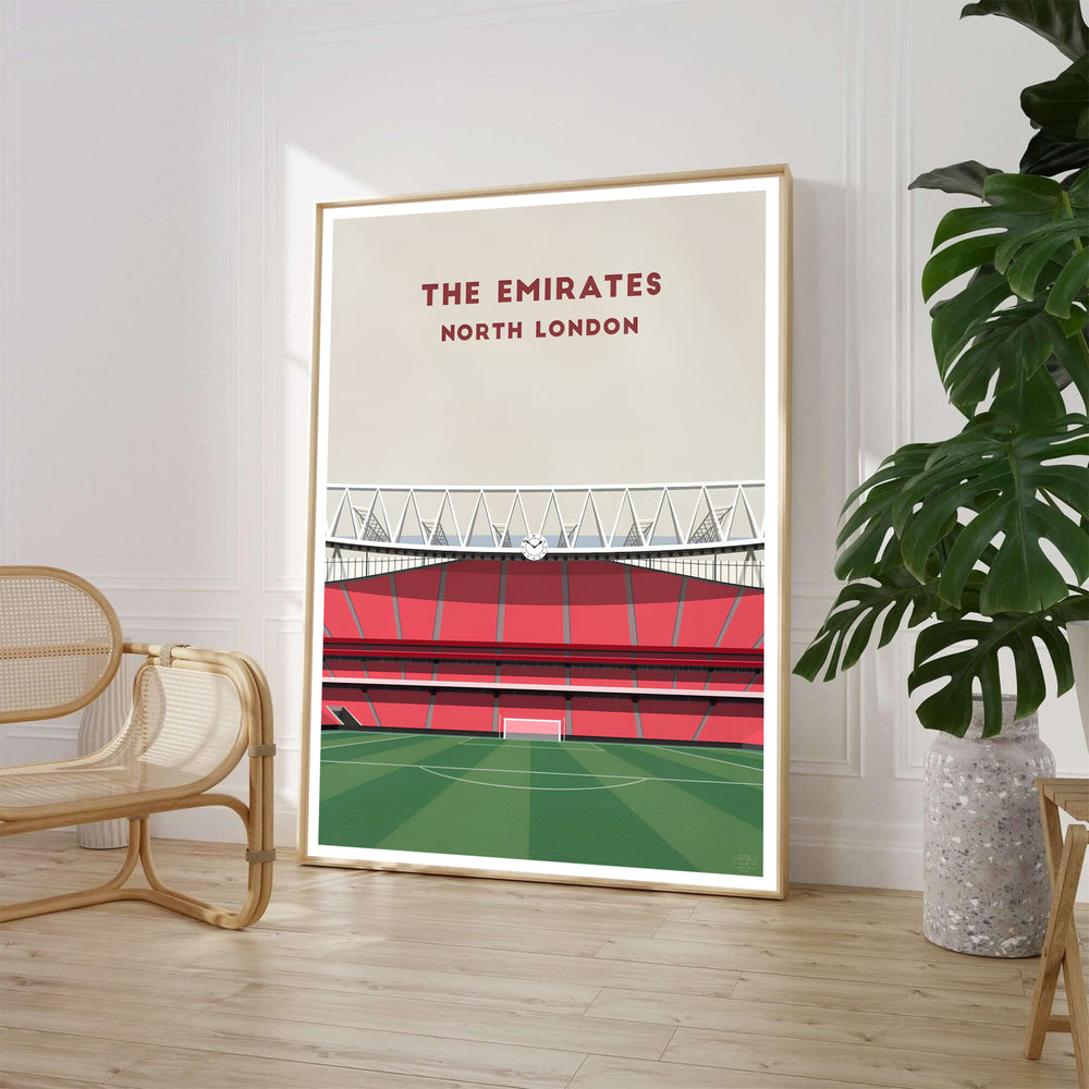 Minimalist architectural Emirates Stadium North London travel poster print featuring red seating stands and historic clock, available framed, unframed, or on canvas at MapYourDreams.