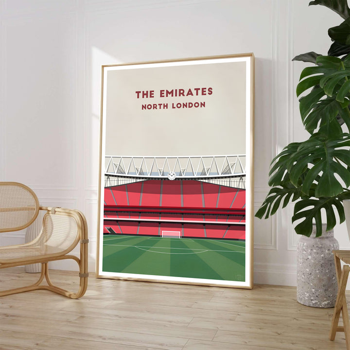Minimalist architectural Emirates Stadium North London travel poster print featuring red seating stands and historic clock, available framed, unframed, or on canvas at MapYourDreams.
