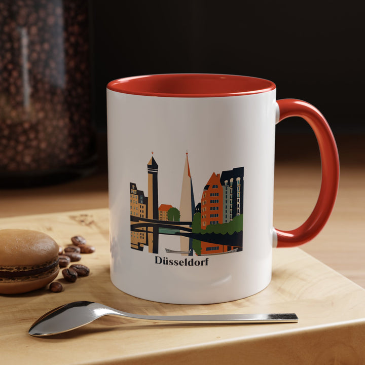 Enjoy your favorite beverages with this Düsseldorf mug featuring artwork of the city’s iconic Media Harbor and old town. Perfect for coffee and tea lovers, this durable mug is dishwasher-safe, making it an ideal gift or keepsake.