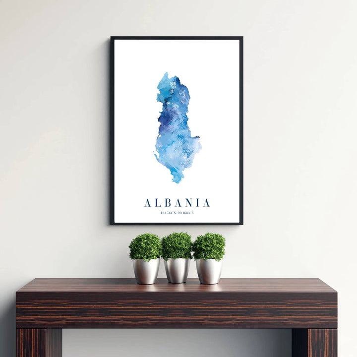 Abstract blue watercolor map poster of Albania with geographical coordinates 41.1533° N, 20.1683° E, crafted to enhance contemporary aesthetic wall decor. Offered by MapYourDreams, this artwork is available in flexible options including unframed paper, custom wooden frames, and gallery canvas wraps for room decor.