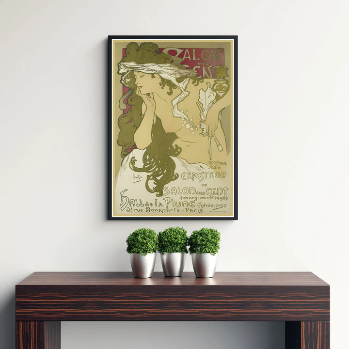 French travel and art advertisement poster Salon Des Cent by artist Alphonse Mucha showing earthy sage and olive tones at 31 Rue Bonaparte Paris. MapYourDreams supplies framed, unframed, and canvas poster options for wall decor.