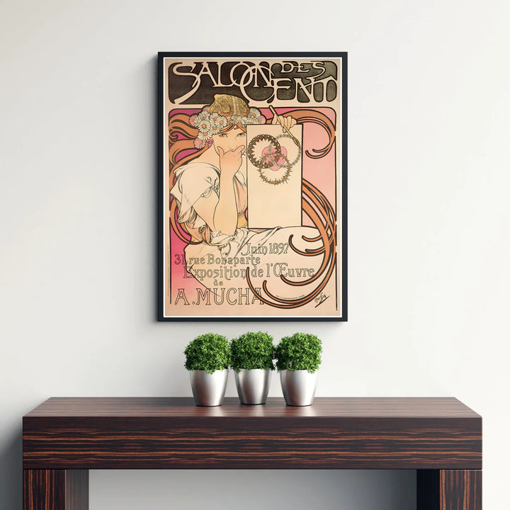 French travel and art advertisement poster Salon Des Cent by artist Alphonse Mucha showing floral heart illustrations at 31 Rue Bonaparte Paris. MapYourDreams supplies framed, unframed, and canvas poster options for wall decor.