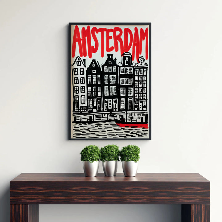 Architectural block print poster combining hand-carved building outlines with bold red text in Amsterdam, presented by MapYourDreams with selection choices for fine art unframed paper prints, gallery stretched canvas art, or high-end custom frame choices to suit any setup.