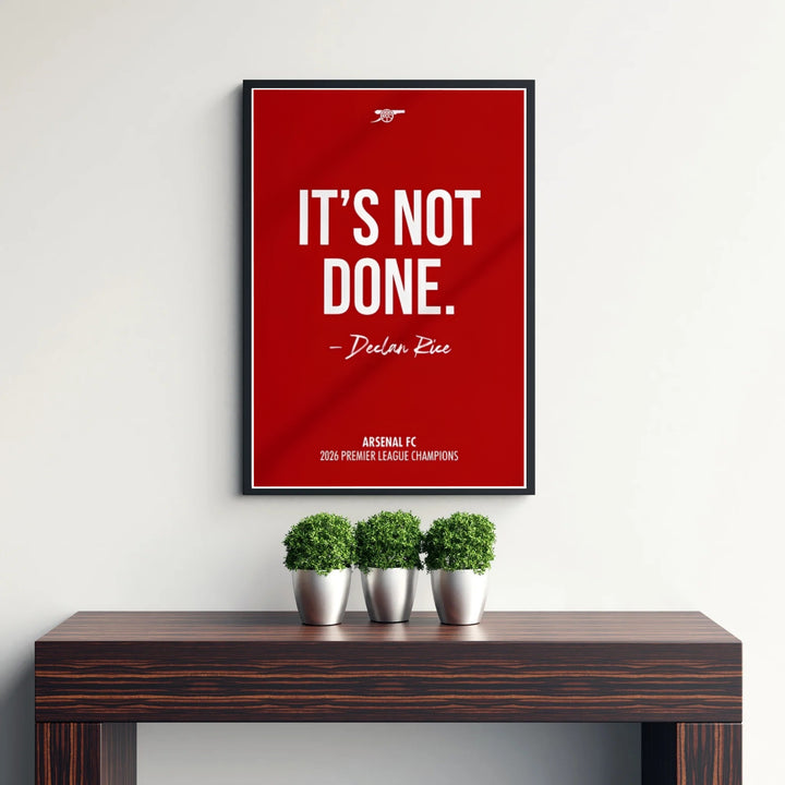 Dramatic Arsenal FC motivational text print showing Declan Rice name and club cannon motif at Emirates Stadium, available as unframed prints, framed wall art, or canvas prints for office styling.