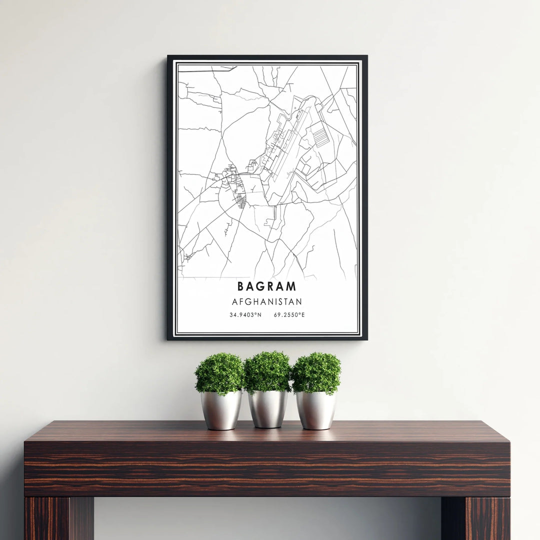 Fine cartography print of Bagram Afghanistan showing street layouts and airfield runways in a modern black and white layout, available from MapYourDreams as an unframed paper print, gallery wrapped canvas wall art, or custom framed print in retro white frames for minimalist home interiors.