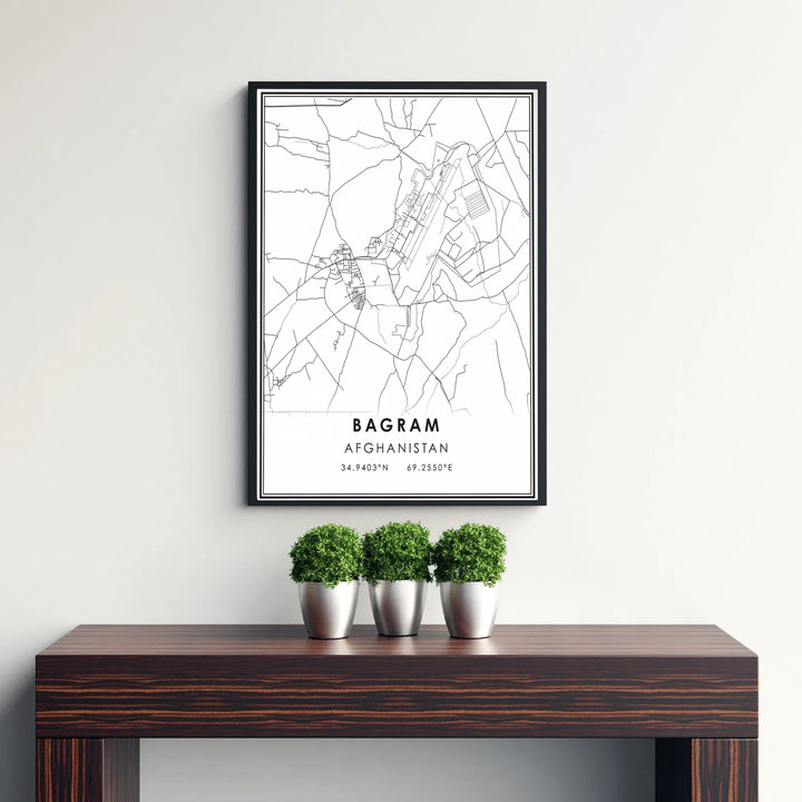 Fine cartography print of Bagram Afghanistan showing street layouts and airfield runways in a modern black and white layout, available from MapYourDreams as an unframed paper print, gallery wrapped canvas wall art, or custom framed print in retro white frames for minimalist home interiors.