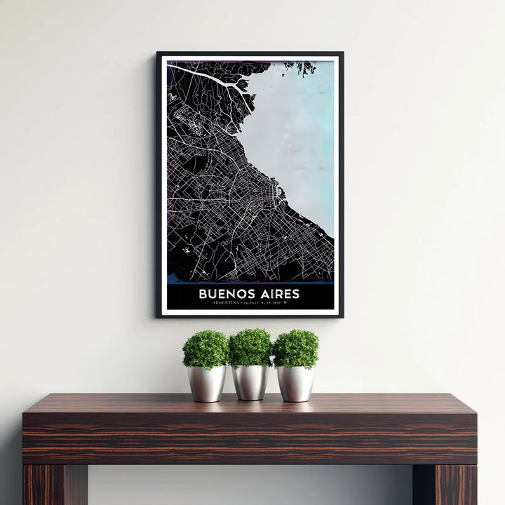 High contrast street map graphic of Buenos Aires featuring white grid lines on obsidian land beside a soft blue estuary. A signature piece from MapYourDreams, this artwork comes ready for display as unframed paper, framed art, or stretched canvas.