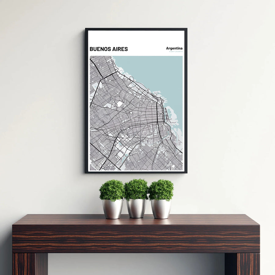 Modern travel poster featuring a detailed street grid map of central Buenos Aires with refined title typography and coordinates. Curated by MapYourDreams, this wall piece offers customizable choices such as archival paper prints, real wood frames, or canvas wraps.
