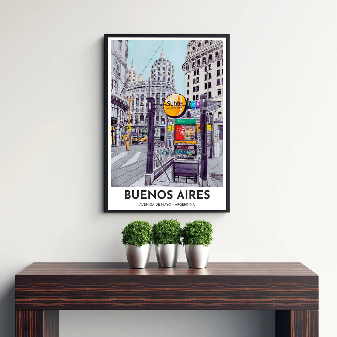 Scenic South American travel poster highlighting the Avenida de Mayo Subte station entrance and surrounding architectural cupolas. Offered by MapYourDreams, customers can choose between standalone paper prints, ready-to-hang wooden frames, and gallery canvas wraps.