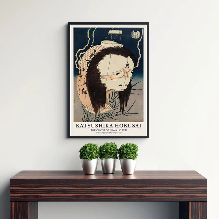 Refined Japanese folklore poster of The Ghost of Oiwa by artist Katsushika Hokusai displaying a traditional spooky paper lantern print in Minneapolis. Discover tailored framed, unframed, and canvas print decor options at MapYourDreams.