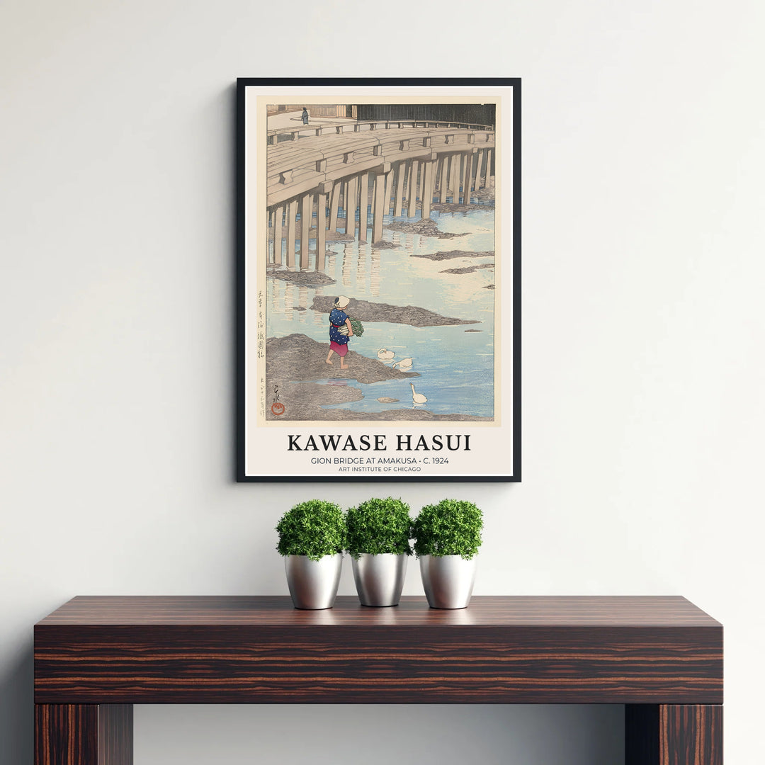 Japanese Shin-hanga woodblock poster Gion Bridge at Amakusa by artist Kawase Hasui showcasing indigo working clothes and stone pillars at Gion Bridge in Amakusa. Discover custom framed, unframed, and canvas print decor options at MapYourDreams.