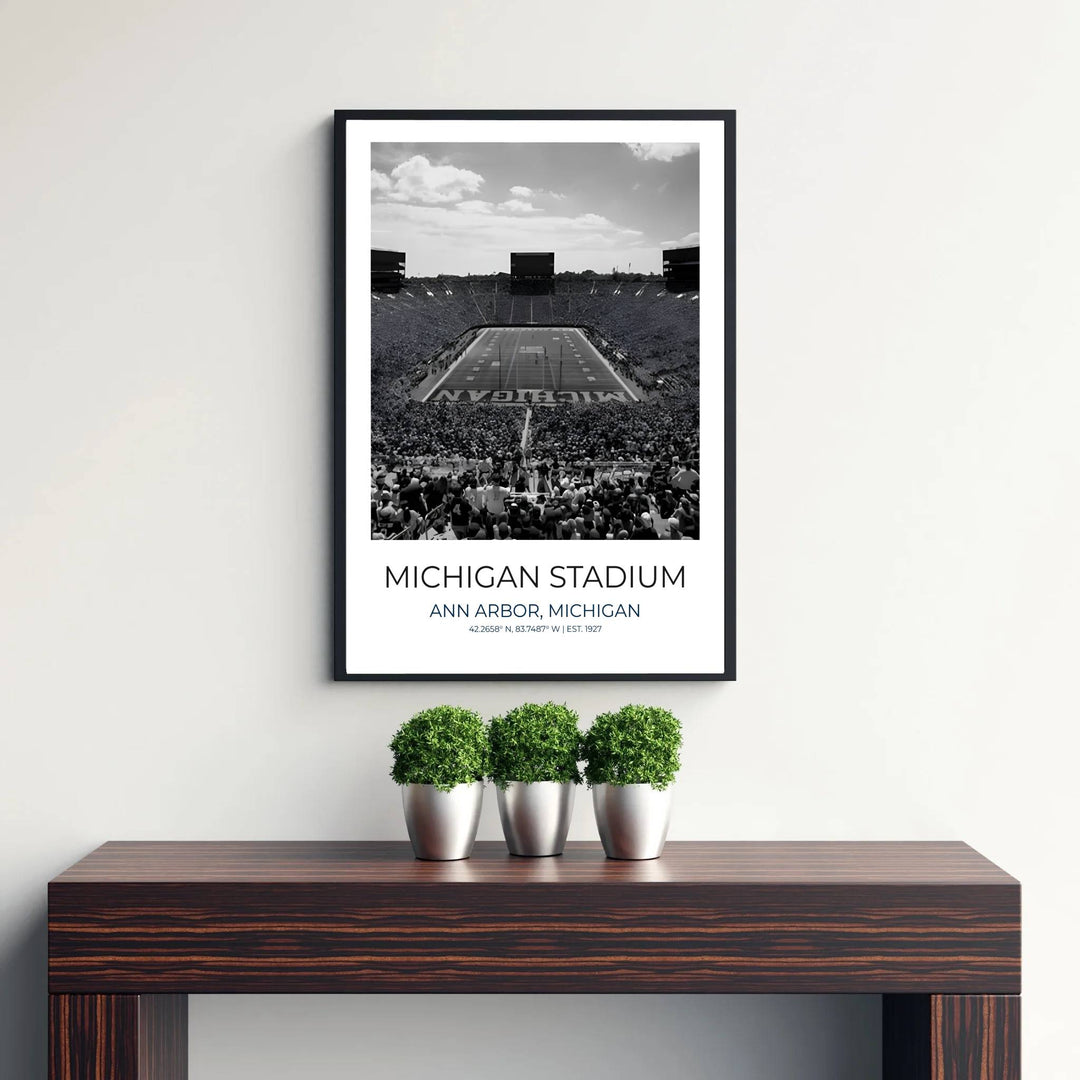 Classical college sports architecture poster featuring Michigan Stadium in Ann Arbor Michigan rendered in rich black and white. Supplied by MapYourDreams, this artwork is available in flexible options including unframed paper, custom wooden frames, and gallery canvas wraps for stylish decor.