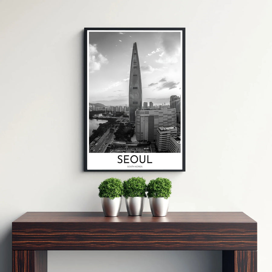 Atmospheric grayscale cityscape photo print showing Lotte Tower and Han River urban landscape in Seoul, designed by MapYourDreams in customizable choices including unframed archival paper, metallic gold frames, and canvas wraps that effortlessly suit diverse interior design aesthetic themes.