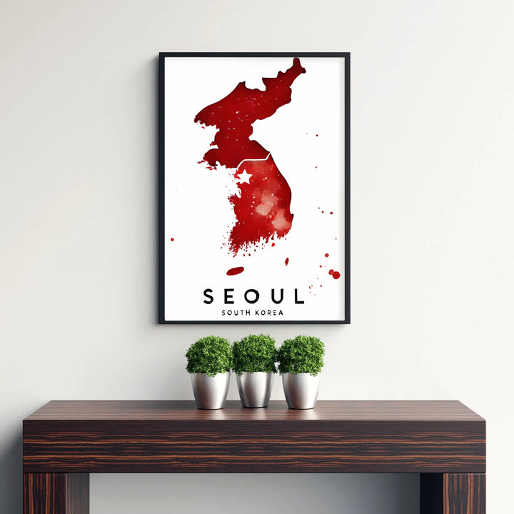 Vibrant red watercolor travel decor print capturing the silhouette and capital star of Seoul, South Korea, brought to you by MapYourDreams in flexible display options such as unframed prints, ready-to-hang frames, and wrapped canvas ideal for living rooms or home offices.