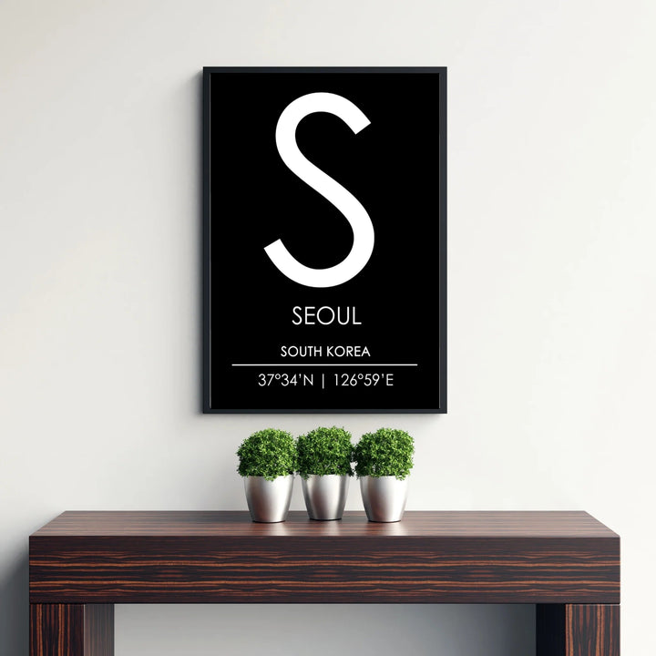 Detailed black and white letter S monogram art print featuring seoul south korea text and coordinates, designed by MapYourDreams in customizable choices including unframed archival paper, metallic gold frames, and canvas wraps that suit contemporary and industrial decor themes perfectly.