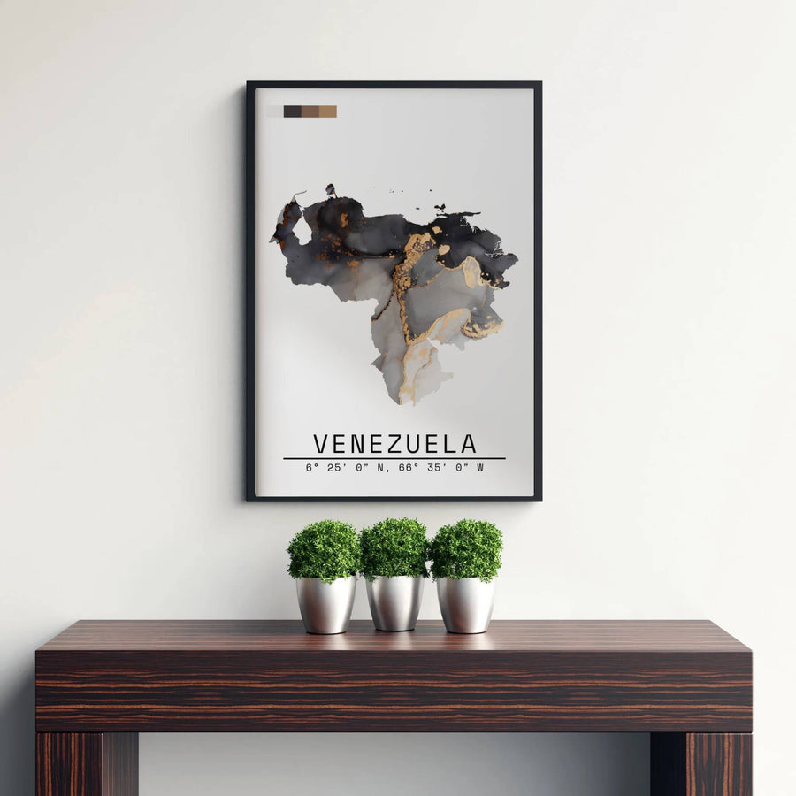 High-contrast charcoal black, sepia, and metallic gold wall art showing the abstract fluid ink map silhouette of Venezuela. Curated by MapYourDreams, this wall piece offers customizable choices such as archival paper prints, real wood frames, or canvas wraps.