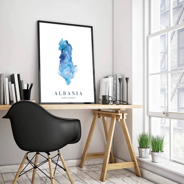 Detailed map art print of Albania with latitude and longitude details, rendered in layered sapphire blue watercolor textures on premium paper stock. Offered by MapYourDreams, this artwork is available in flexible options including unframed paper, custom wooden frames, and gallery canvas wraps for room decor.