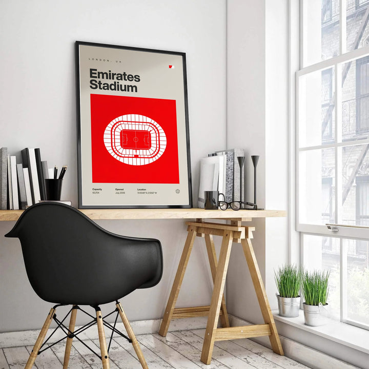 Graphic architectural stadium illustration featuring the top-down floorplan of Emirates Stadium framed inside a vibrant red square on off-white paper. Upgrade your wall decor with options ranging from unframed archival paper prints to sturdy custom wood frames and textured gallery canvas setups.