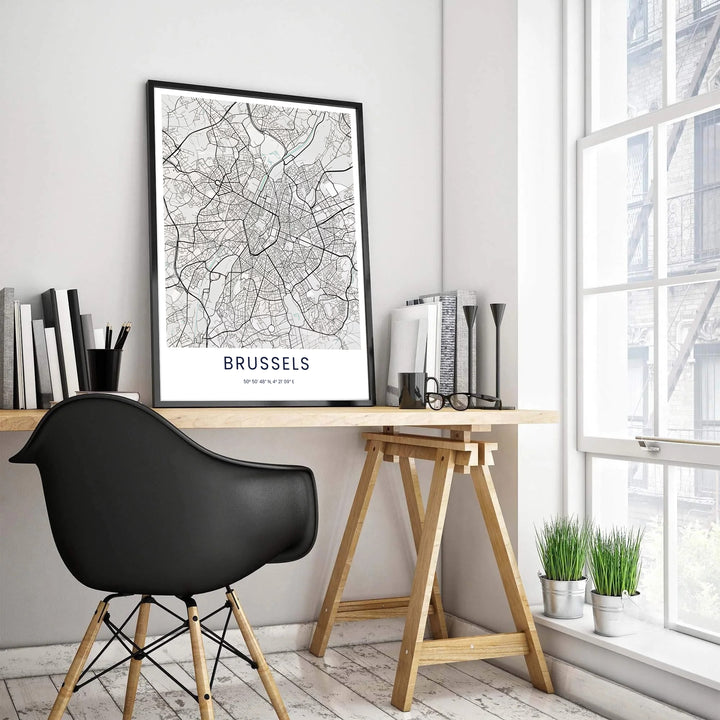High-resolution black and white city map poster of Brussels in Belgium with clean vector lines and precise latitude and longitude coordinates. Customers can choose from several presentation options including unframed fine art paper, custom wood and metal frames, and gallery wrapped canvas wall decor.