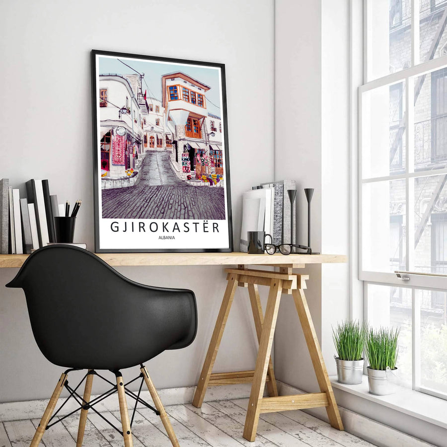 Intricate hand-woven red carpets hang outside traditional artisan shops along the cobblestones of Gjirokastër Albania in this detailed print. MapYourDreams presents this print in options ranging from unframed paper to handcrafted frames and gallery canvas wraps for any wall display.