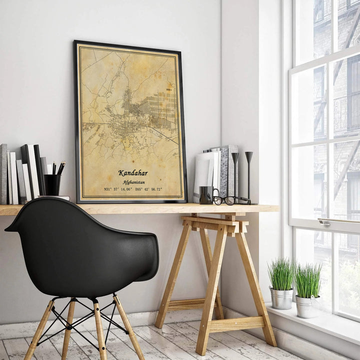 Styled vintage map poster featuring the detailed street network and latitude longitude coordinates of Kandahar, Afghanistan, on a warm beige parchment background. MapYourDreams offers options including an unframed paper print, a ready-to-hang canvas wall art piece, or a framed poster in grey, bronze, and gold frame finishes.