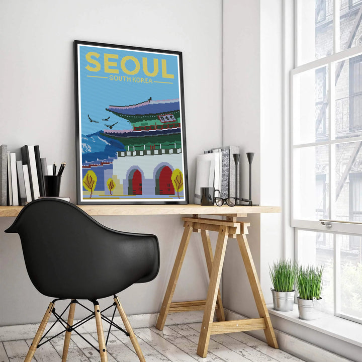 Pixelated needlework travel art print of Gwanghwamun Gate in Seoul, South Korea, capturing the stone masonry wall, grand arched portals, jade green pavilion, and distant mountain skyline. Offered by MapYourDreams, this artwork is available in flexible options including unframed paper, custom wooden frames, and gallery canvas wraps.