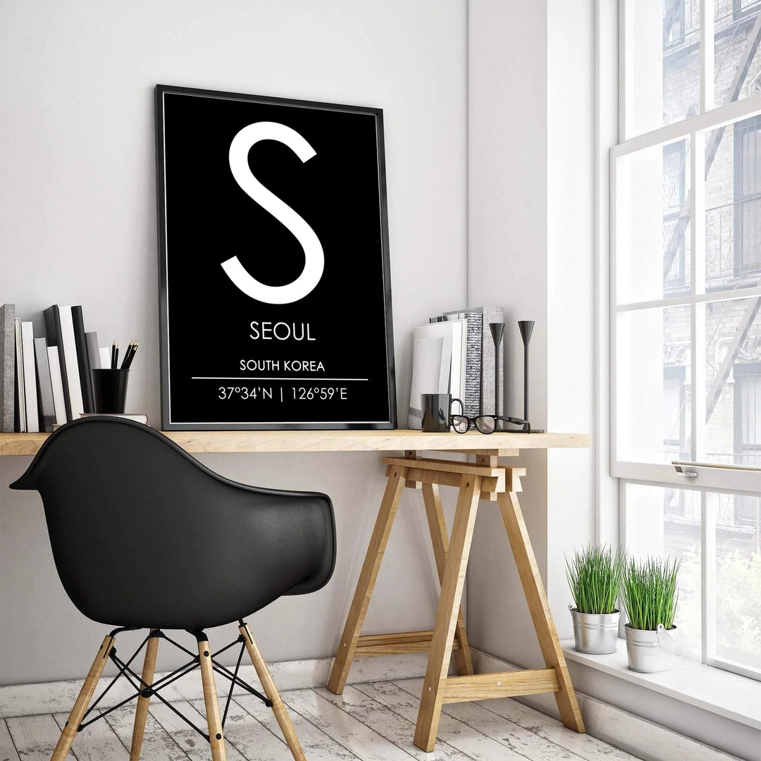 High-contrast seoul city initial wall art print featuring a large white letter S and precise geographical coordinates, crafted by MapYourDreams in adaptable styles including unframed matte paper, wooden frames, and gallery canvas formats engineered for exceptional clarity and long-lasting durability.