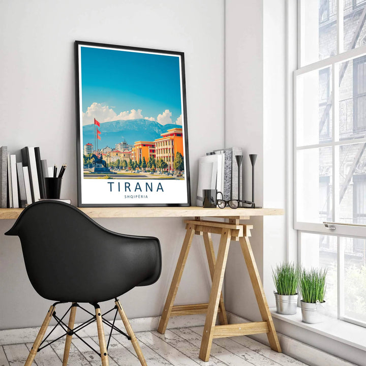 Soft daytime clouds drift over the dramatic mountain range behind Skanderbeg Square in Tirana Albania, accented by bold serif typography reading Tirana Shqipëria. MapYourDreams offers this piece printed on archival stock with options for custom frames or canvas wraps to complete your gallery wall.