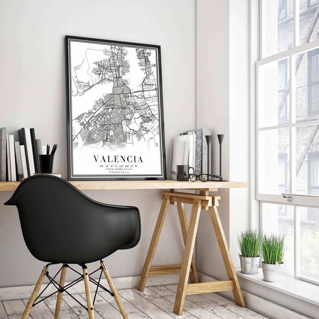 Black and white cartography travel poster of Valencia showcasing detailed street lines, establishment date 1555, and classic border typography. Presented by MapYourDreams, this piece comes in flexible choices such as unframed paper stock, custom frames, and gallery canvas wraps.