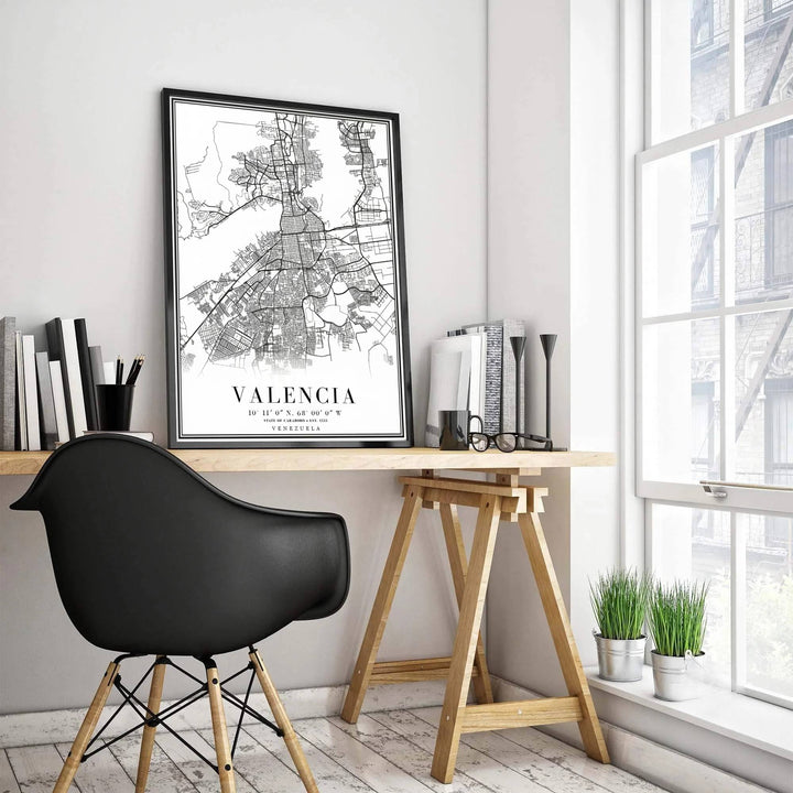 Black and white cartography travel poster of Valencia showcasing detailed street lines, establishment date 1555, and classic border typography. Presented by MapYourDreams, this piece comes in flexible choices such as unframed paper stock, custom frames, and gallery canvas wraps.